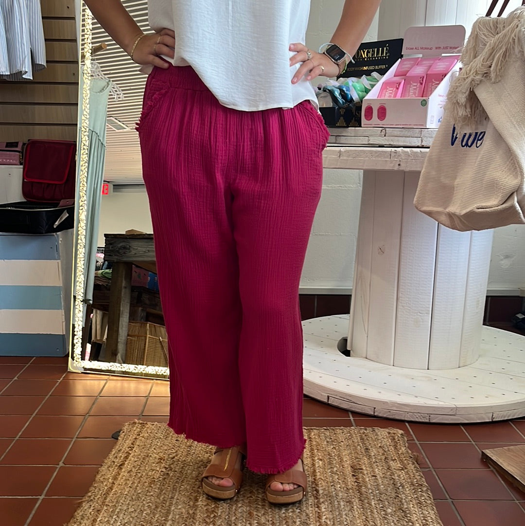 Umgee wide leg pants with fray, Available in sizes Small through Large.100% Cotton. Black. Raspberry.