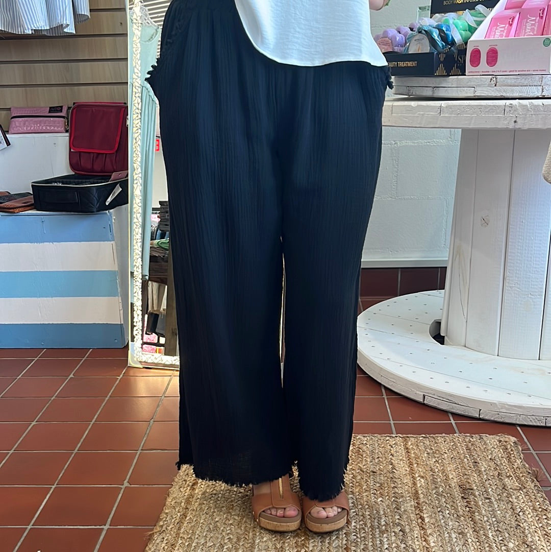 Umgee wide leg pants with fray, Available in sizes Small through Large.100% Cotton.  Black.