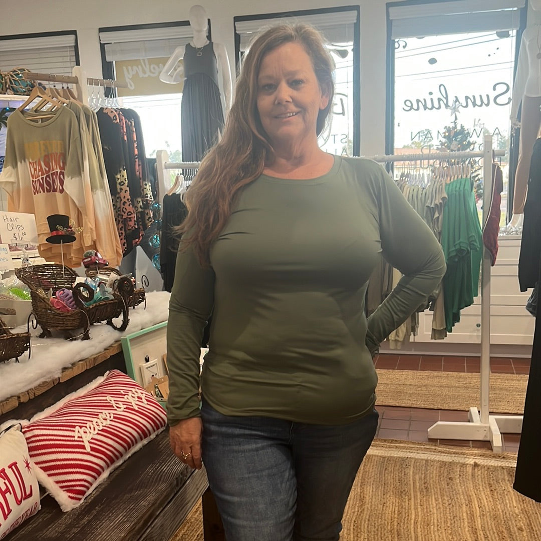 Plus size brushed microfiber long sleeve T-Shirt available in sizes 1X-3X. 90% Polyester, 10% Spandex. Brand: Zenana.  Light Olive.