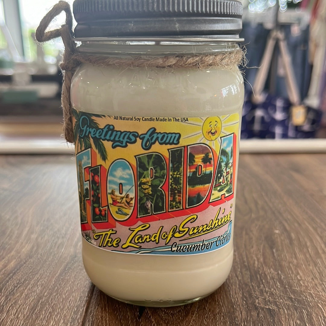 Greetings from Florida-The Land of Sunshine.  Cucumber Citrus Candle.  All Soy.  Made in the USA. 16 oz.