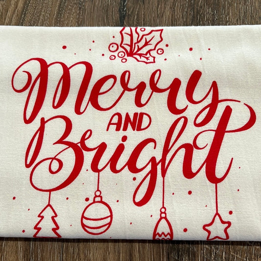 Merry and Bright Tea Towel with Holly and Ornaments.  100% Cotton.  Length-28.5" Width-27.25" Green Bee Towels