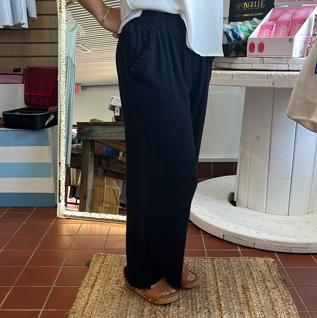 Umgee wide leg pants with fray, Available in sizes Small through Large.100% Cotton. Black.