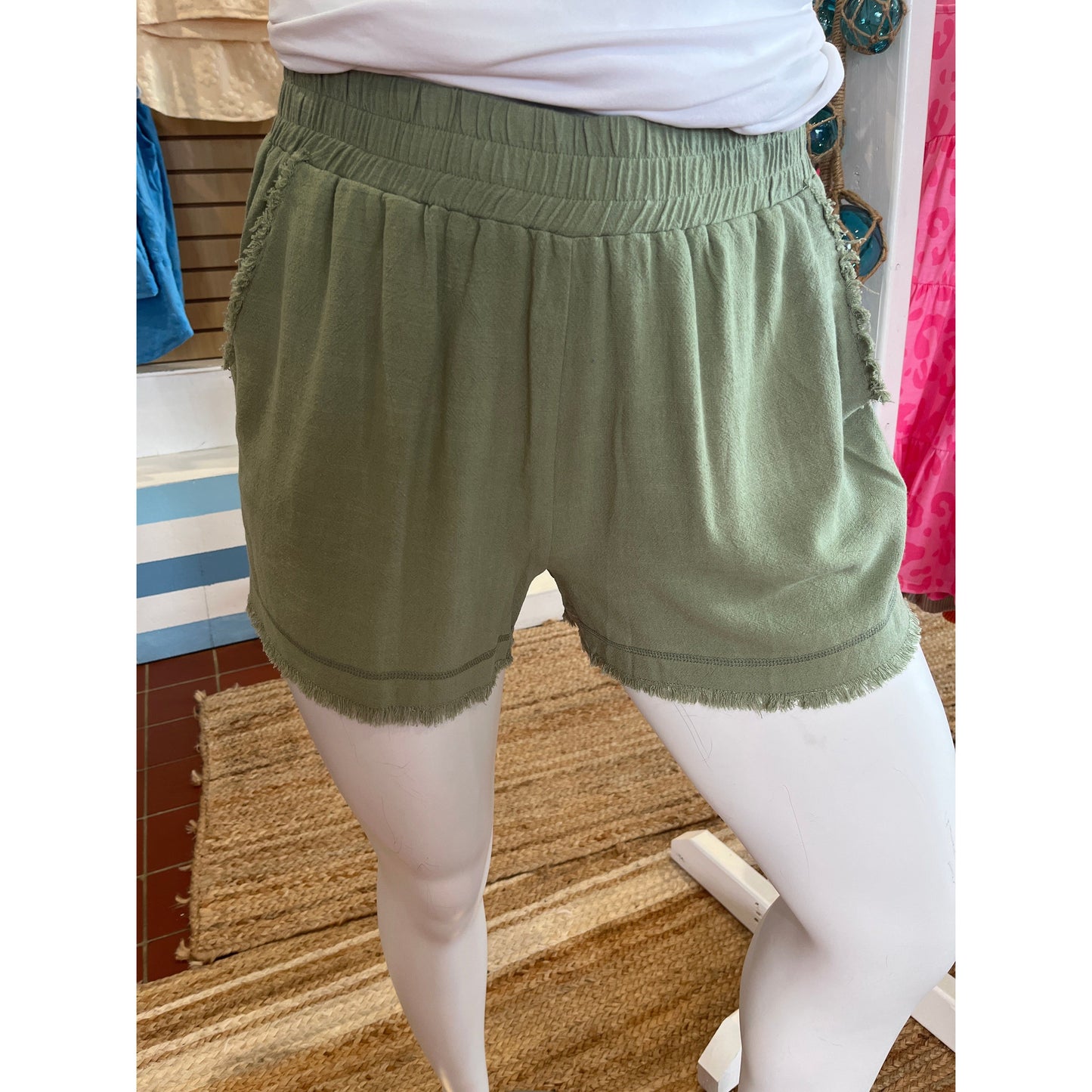 Plus size sage linen blend shorts.  Available in sizes XL-2XL.  55% Linen, 45% Cotton. Brand: Umgee