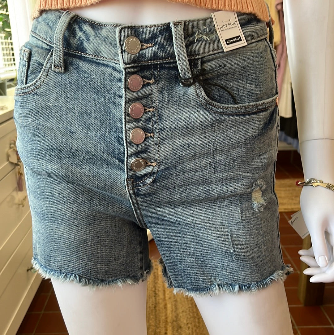 Judy Blue High Waist Button Fly Distressed Shorts available in sizes Small through Large. 94% Cotton, 5% Polyester, 1% Spandex