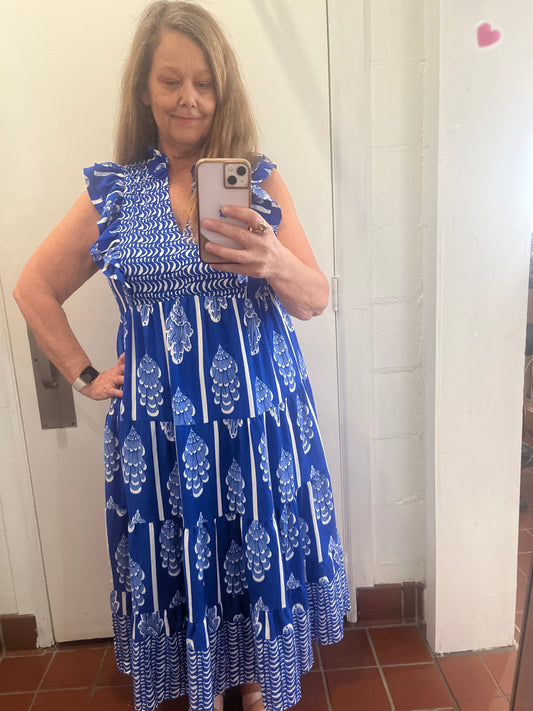 Border print dress available in sizes Small through Large in Blue and Cream and Black and Cream.