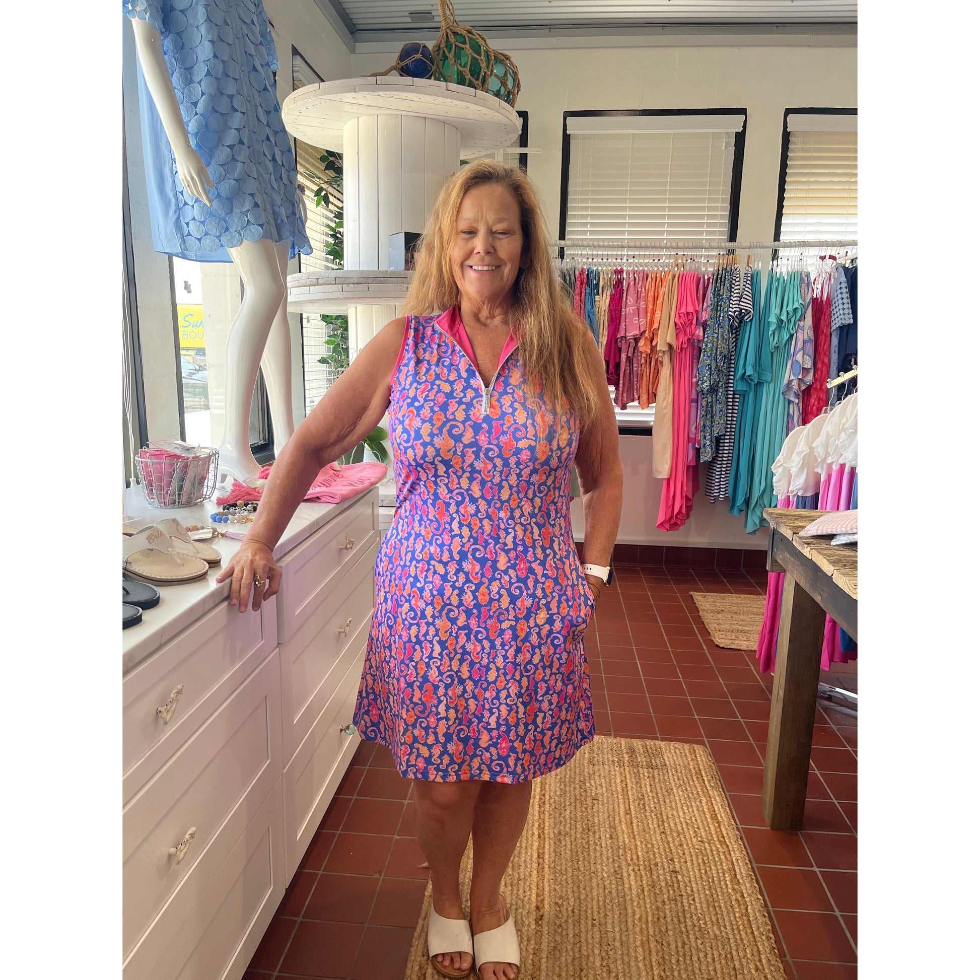 Seahorse "Lexi" Swing Dress, available in sizes Medium through XL.  Brand: Ana Clare.  85% Polyester, 15% Spandex.