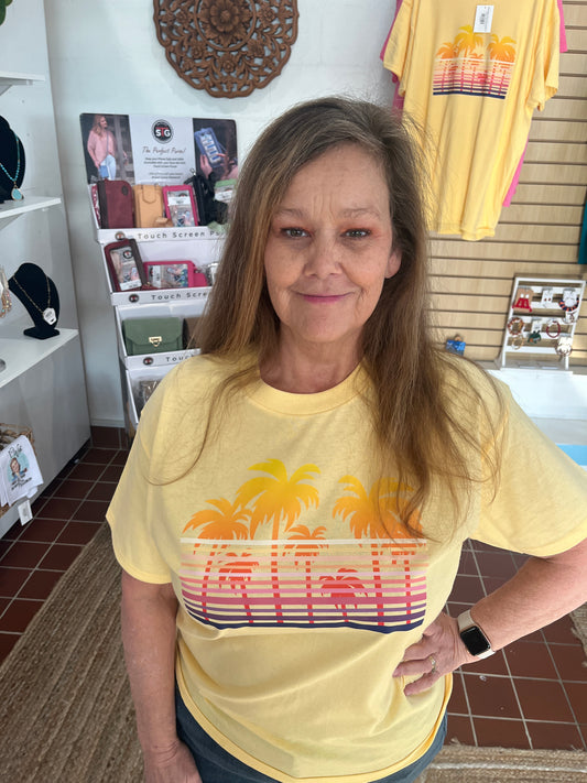 Retro Palms Graphic T.  Available in sizes Small through XL in Yellow Haze or Azalea.  100% Cotton.