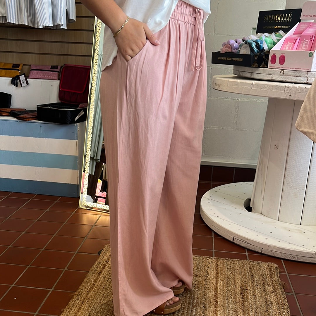 Lightweight wide leg pants. Available in sizes Small through Large. Brand: Heyson. 55% Hemp, 45% Polyester. Light Pink