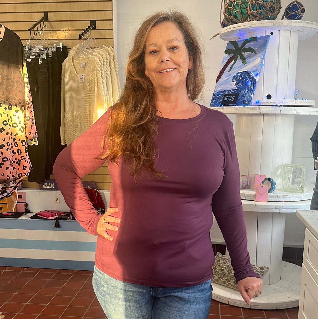 Plus size brushed microfiber long sleeve T-Shirt available in sizes 1X-3X. 90% Polyester, 10% Spandex. Brand: Zenana. Eggplant.