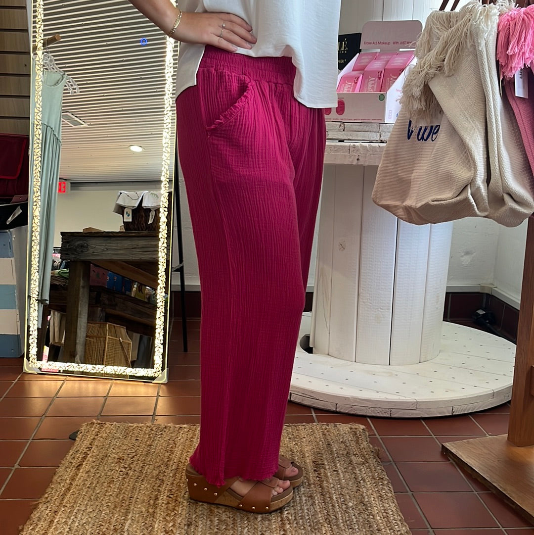 Umgee wide leg pants with fray, Available in sizes Small through Large.100% Cotton. Raspberry.
