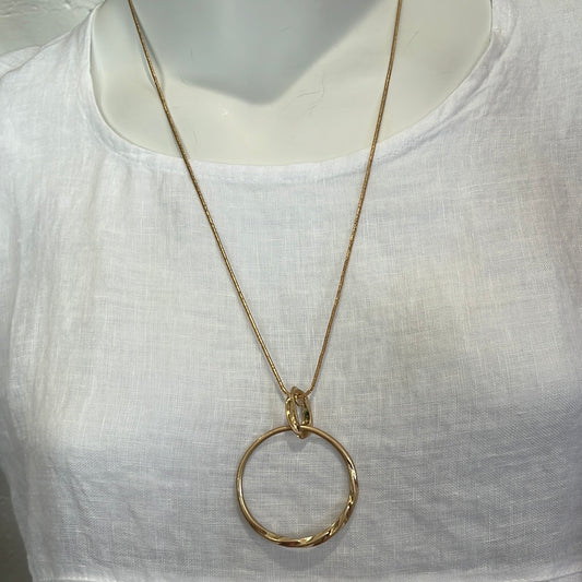 18" gold necklace with circle pendant.  earrings