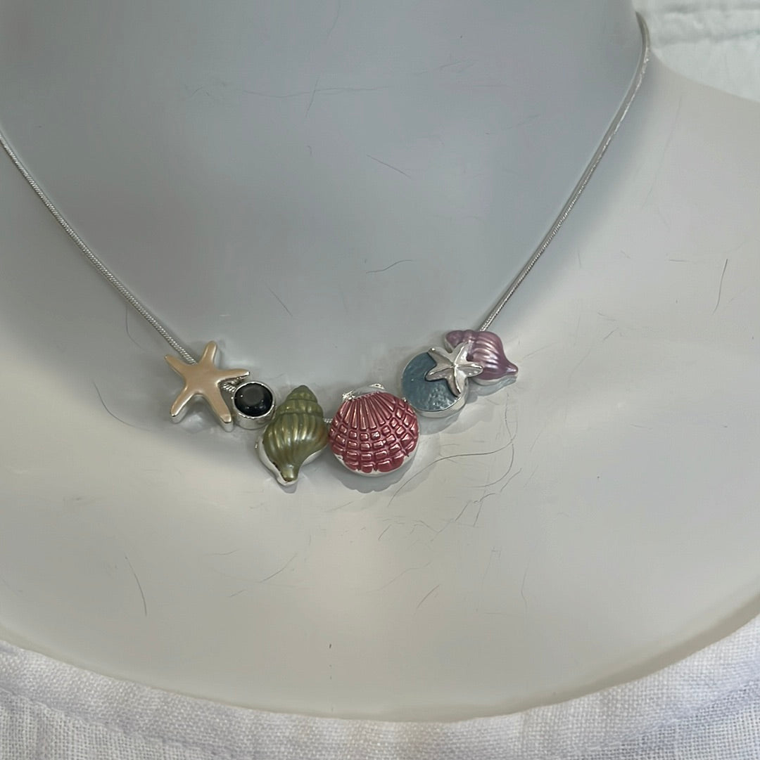 Beachy necklace with starfish earrings available in Blue or Pink