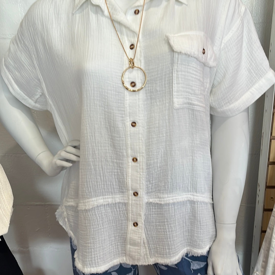 Plus size white gauze button down shirt available in sizes 1X-3X. 100% Cotton.  Easel