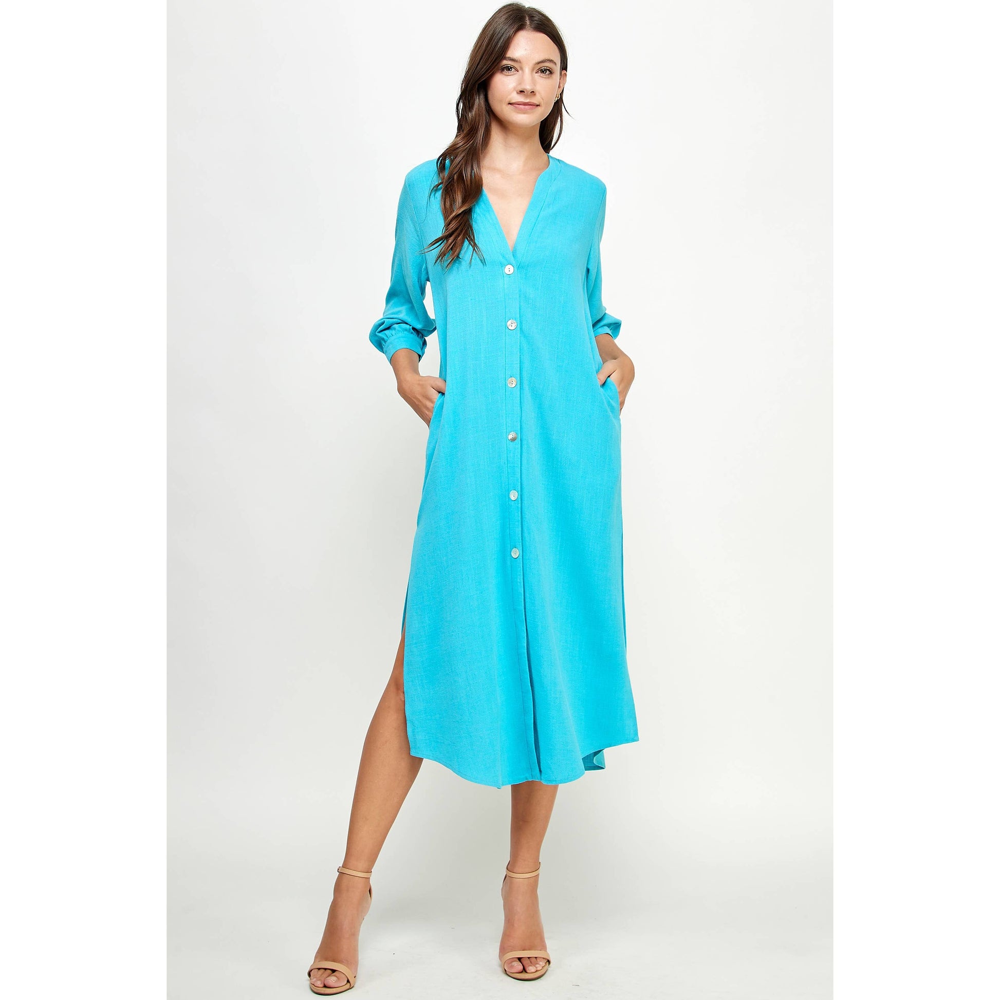 Blue V-Neck Button Down Linen Dress by Ellison Apparel.  Available in sizes Small through Large.  70% Viscose, 30% Linen.