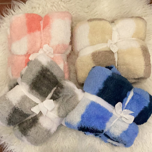 100% Polyester Sherpa Throws.  Available in Pink/White, Blue/White, Tan/White, and Gray/White.