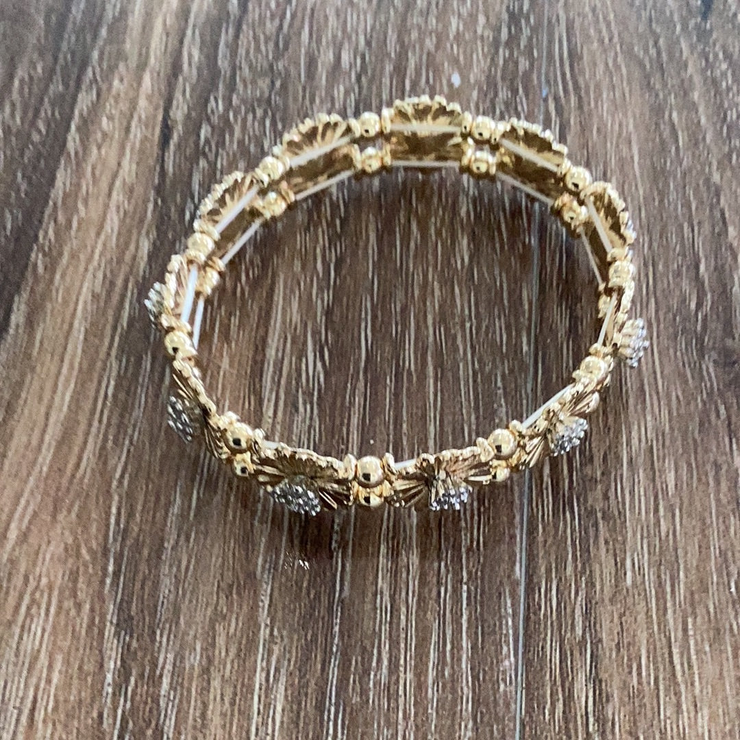 Two tone multi daisy gold and rhodium bracelet