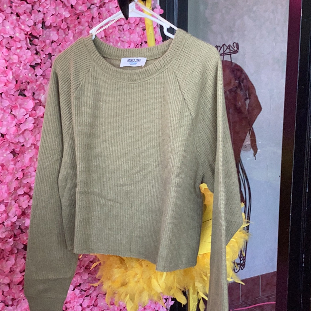 Cropped lightweight sweater, available in sizes Small through Large. 85% Polyester, 15% Rayon. Olive