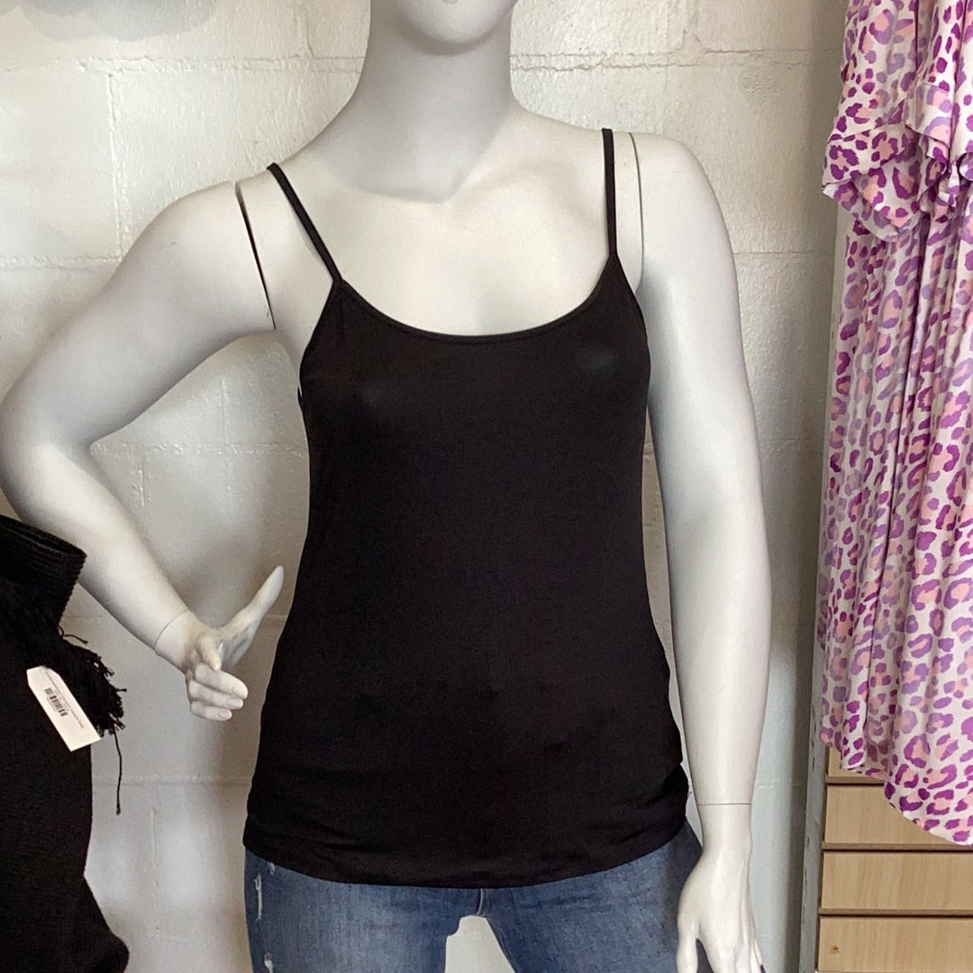 Plus size solid cami available in sizes 1X and 2X.95% Polyester, 5% Spandex. Black