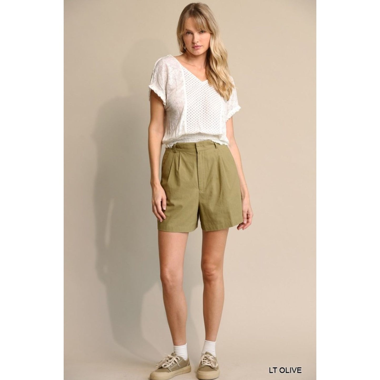 Gigio tailored mid-length shorts ,  sizes Small through Large. 100% Cotton.  Olive